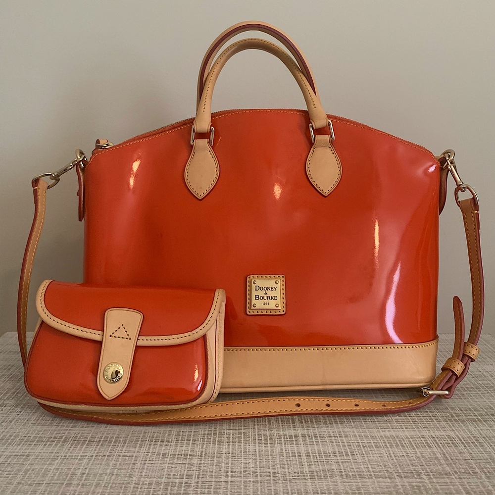 Orange Dooney & Burke purse with matching wristlet